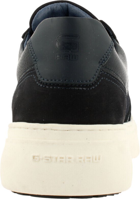Achterkant van een blauwe G-Star Raw sneaker met crèmekleurige zool met logo.