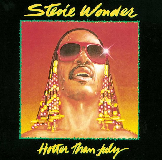 Stevie Wonder met rode zonnebril en lange, kleurrijke oorbellen. Titel: Hotter Than July.