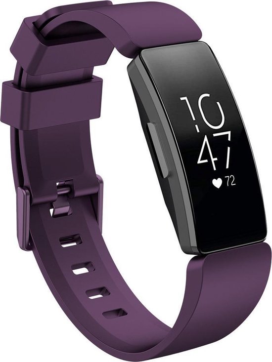 Paars siliconen horlogebandje om een Fitbit Inspire met een zwarte wijzerplaat, 10:47 en 72 hartslagen per minuut.