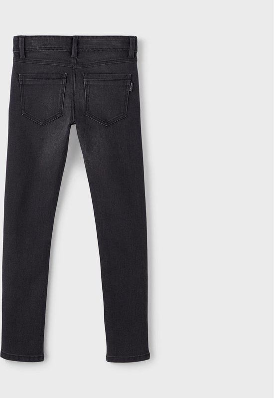 Grijze slim fit spijkerbroek voor jongens, gezien vanaf de achterkant.