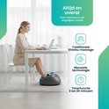 Vrouw met voetmassager, "Altijd en overal Past naadloos in uw dagelijkse routine" met pictogrammen voor Shiatsu massage, nieuwste technologie en timerfunctie.