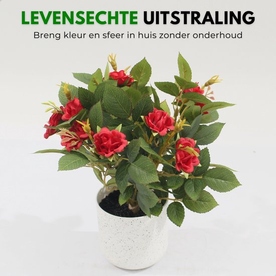 Kunstplant met rode rozen, groene bladeren en een witte pot met spikkels. Levensechte uitstraling.