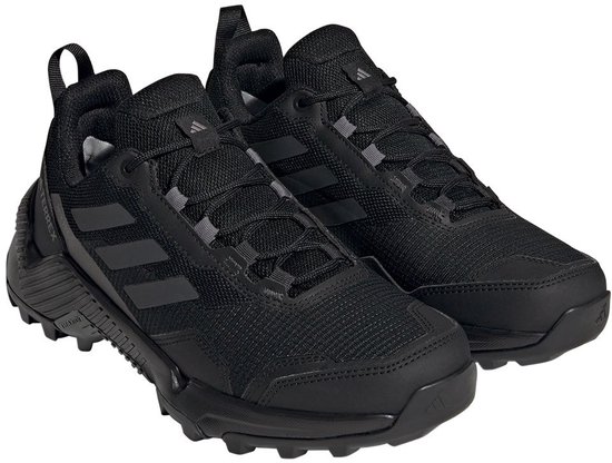 Zwarte dames wandelschoenen van adidas Terrex RAIN.RDY met veters en grijze strepen.