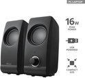 Twee zwarte Trust speakers met ronde speakers, volumeknop en USB-aansluiting. 16W piekvermogen.