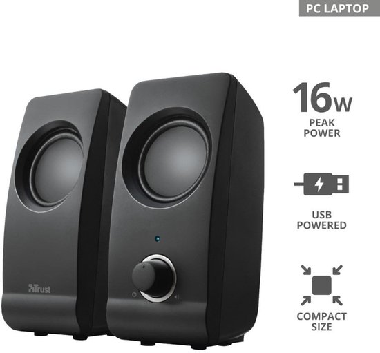 Twee zwarte Trust speakers met ronde speakers, volumeknop en USB-aansluiting. 16W piekvermogen.