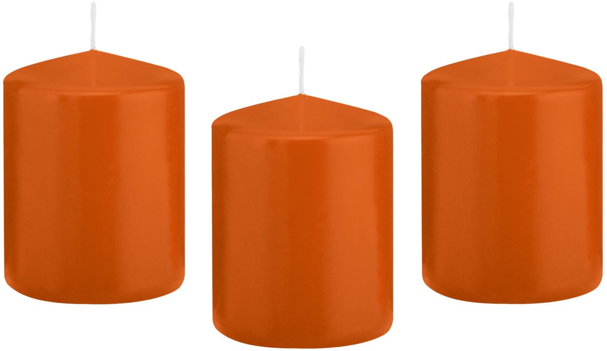 Trend Candles cilinder kaarsen - 12x - stompkaarsen - oranje - 6 x 8 cm - 29 branduren - Geurloze kaarsen - Woondecoratie