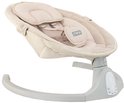 Zij-aanzicht van de beige babyschommel met verstelbare hoofdsteun, riemen en grijze basis.