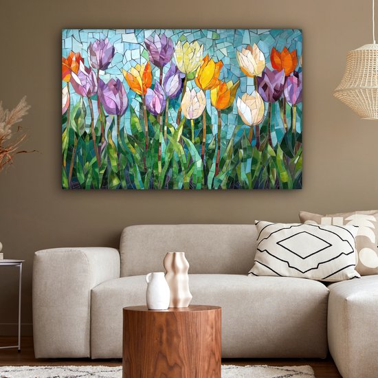 Mozaïek van kleurrijke tulpen boven een hoekbank in een woonkamer met een bijzettafel.