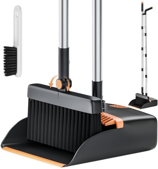 Pelle et balayette noires avec des accents orange et une brosse supplémentaire.