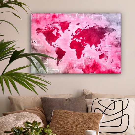 Wereldkaart avec peinture rose vif sur fond avec journal 90x60 cm