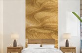Behang - Fotobehang Een gouden achtergrond met glitters - Breedte 120 cm x hoogte 240 cm
