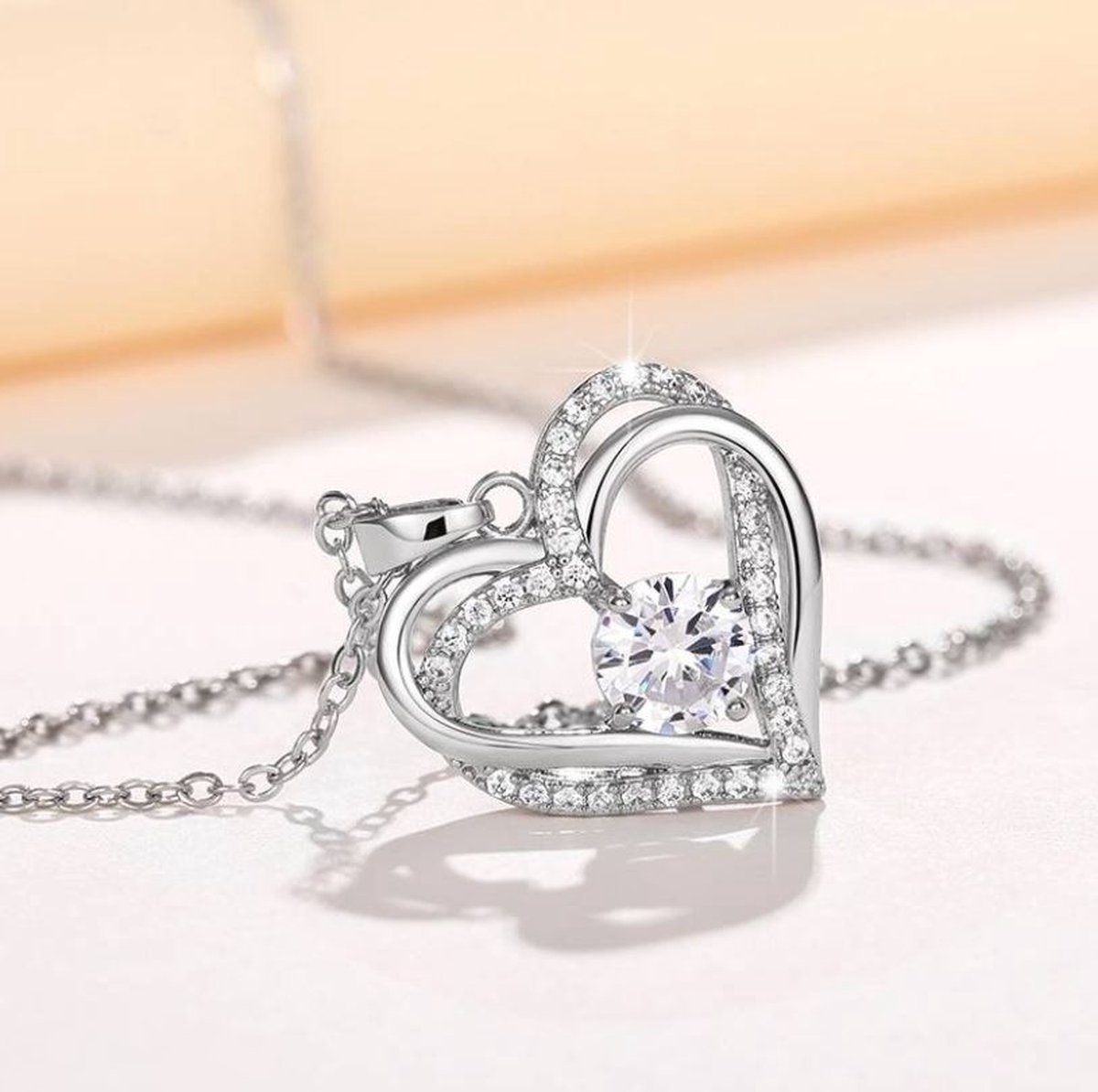 Ketting dubbele hart met zirkonia verzilverd 925
