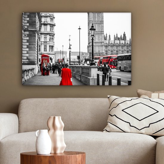 Photo Zwart et blanc d'une femme en robe rouge Toile 90x60 cm - Tirage photo sur toile (Décoration murale salon / chambre)
