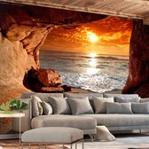 Fotobehangkoning - Behang - Vliesbehang - Fotobehang Uitzicht op Zee vanuit de Grot 3D - Exit from the Cave - 200 x 140 cm
