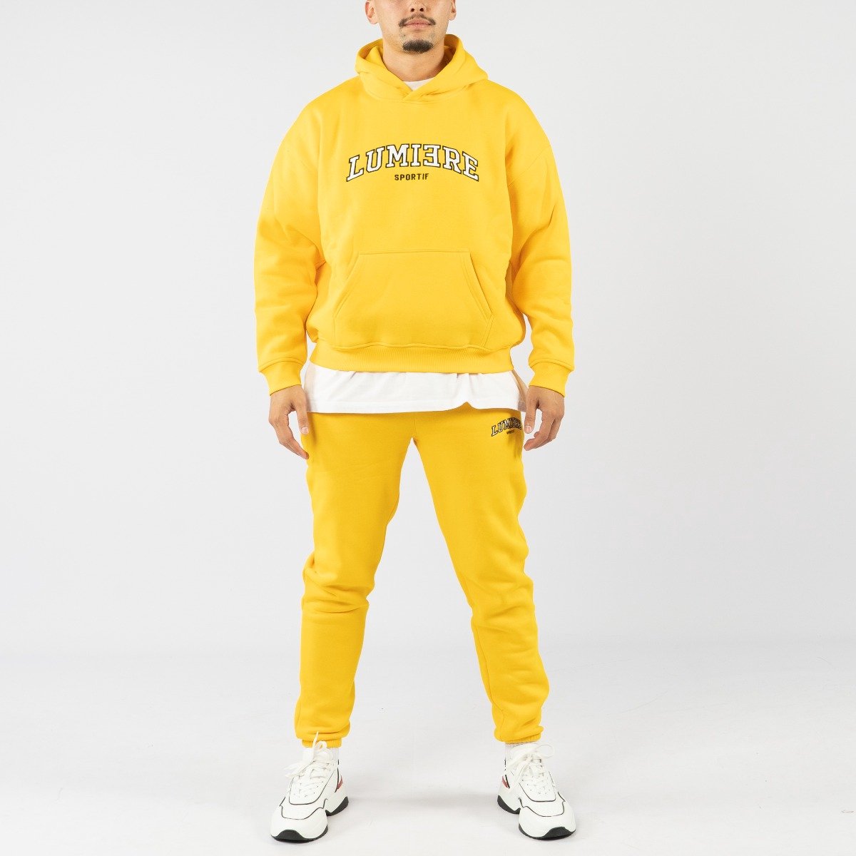 Lumi3re Sportif Trainingspak Yellow bol
