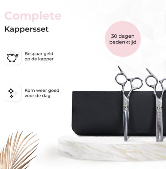 Complete kapperset met scharen, etui en een palmblad.