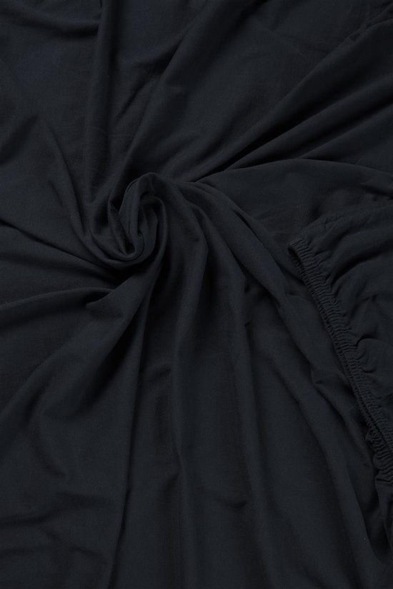 Los donkerblauw jersey stof met elastiek.