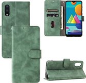 Voor Samsung Galaxy A02 / M02 effen kleur huidgevoel magnetische gesp horizontale flip kalf textuur PU lederen tas met houder & kaartsleuven & portemonnee (groen)