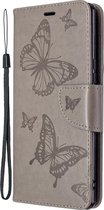 Sony Xperia L4 Hoesje - Mobigear - Butterfly Serie - Kunstlederen Bookcase - Grijs - Hoesje Geschikt Voor Sony Xperia L4