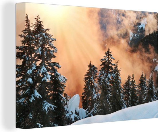 Canvas Schilderij Zonsondergang bij de kerstbomen in de Grouse Mountain in Canada - 60x40 cm - Wanddecoratie