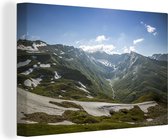 Canvas Schilderij Sneeuw op de bergen van het Nationaal park Hohe Tauern in Oostenrijk - 60x40 cm - Wanddecoratie
