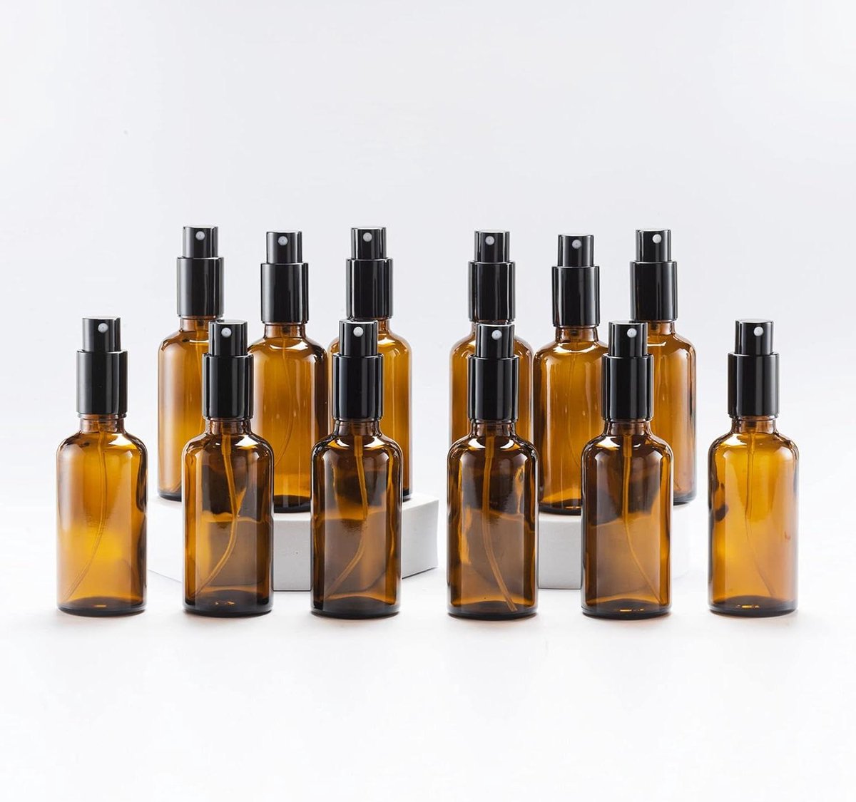 Image of 50 ml amberkleurige glazen spuitfles met metalen dop voor aromatherapie massage - verpakking van 12