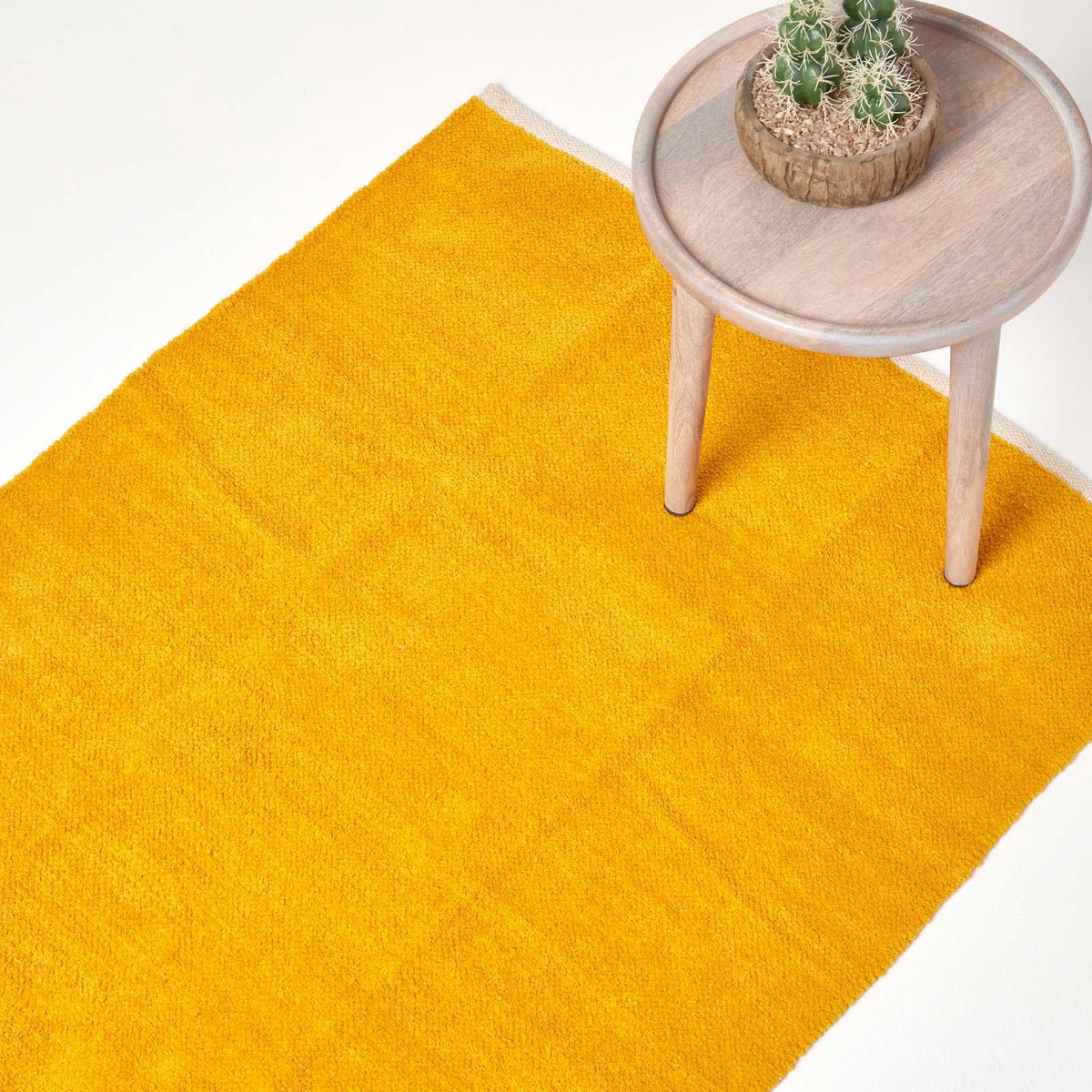 Homescapes mosterdgeel chenille vloerkleed met natuurlijke rand van 100% katoen, 60 x 100 cm