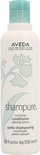 AVEDA Shampure Nurturing Conditioner fles met groene dop en bloemendessin.