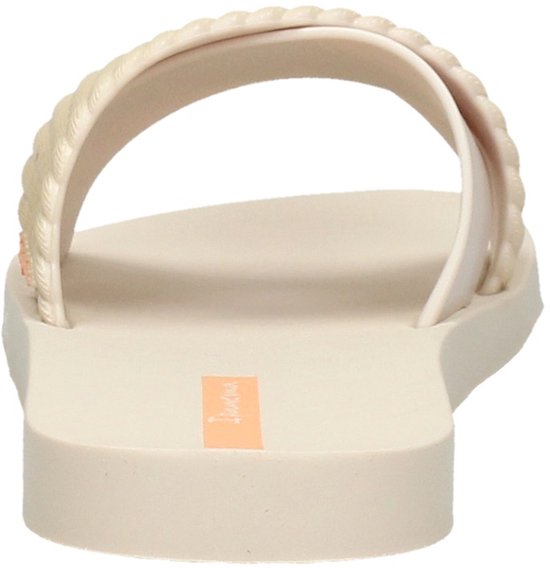 Beige Ipanema slipper met gevlochten band.