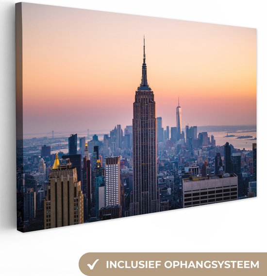 Canvas schilderij 140x90 cm - Wanddecoratie Skyline met de Empire State Building in New York - Muurdecoratie woonkamer - Slaapkamer decoratie - Kamer accessoires - Schilderijen