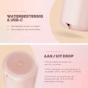 Roze flesverwarmer met USB-C poort en aan/uit knop. Details over waterbestendigheid en opladen.