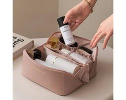 foto van Luxe Make-up Tas Roze + Beauty Blender Spons - Toilettas - Reistas - Tas Voor Toilet Artikelen - Beauty case - Cosmetica tas - Handige Make-up Tas - Make-up Organizer - Skincare Organizer - Reis Toilettas - Multifunctionele Make-up Tasje - Case Tool