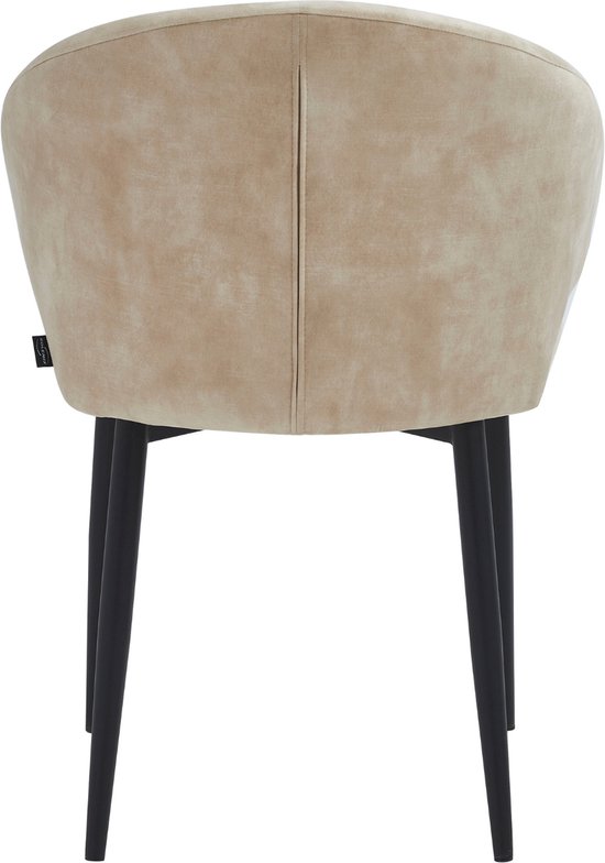 Arrière d'un fauteuil beige clair avec dossier arrondi et pieds noirs.
