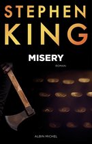 Boekomslag 'Misery' van Stephen King met een bijl en typemachine.