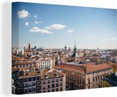 Canvas Schilderij Madrid - Centrum - Wolken - 60x40 cm - Wanddecoratie