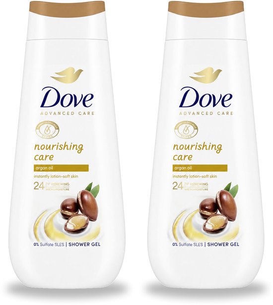 Twee flessen Dove Nourishing Care douchegel met arganolie. De witte flessen hebben gouden accenten en een afbeelding van arganvruchten.