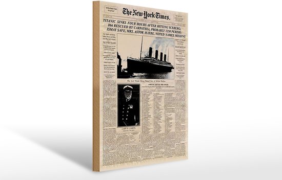 Une enseigne en bois du journal The New York Times avec le titre 'Titanic sinks'.