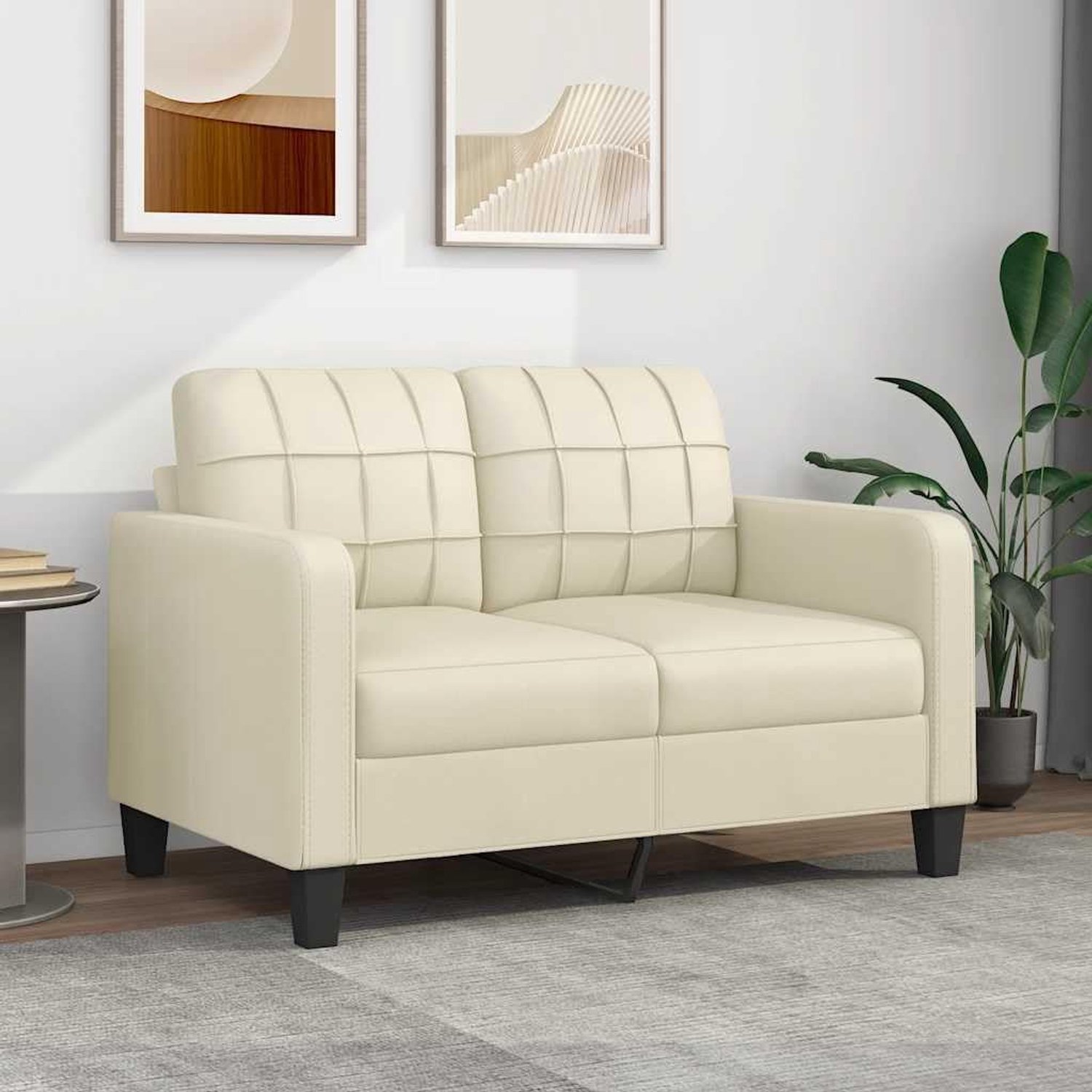 Crème 120 cm kunstleer tweezits bank met robuust metalen frame en dik gevoerde zittingen voor een comfortabele zitervaring in modern design