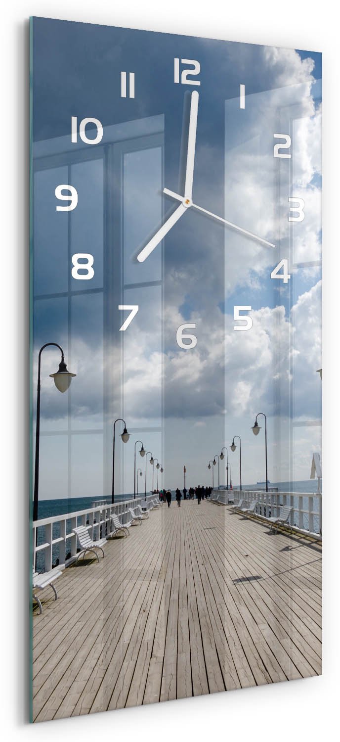 Tulup Wandklok - Pier in Orłowo Glazen Klok Met Print - 30x60 cm - Blauw Wandklok Glas Met Motief - Witte handen - Rechthoekige Klok - Wandklok Glas Decoratie - Gekleurde Glazen Klok