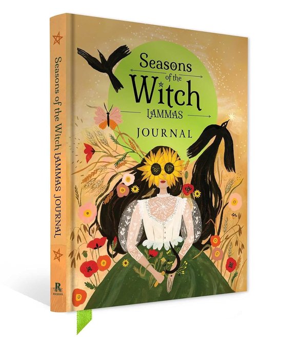 Seasons of the Witch Lammas Journal met een illustratie van een vrouw met zonnebloemgezicht, omringd door bloemen en vogels.