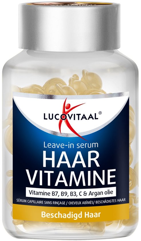 Gele haarvitamine capsules in een doorzichtige pot met label 'Lucovitaal Haar Vitamine' voor beschadigd haar.