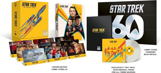 Star Trek 60ste verjaardag set met blu-ray box, 9 lobbykaarten en een 4-inch vinylplaat met thema.