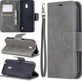 Retro lamsvacht textuur pure kleur horizontale flip pu lederen tas met houder & kaartsleuven & portemonnee & lanyard voor Nokia 2.2 (grijs)