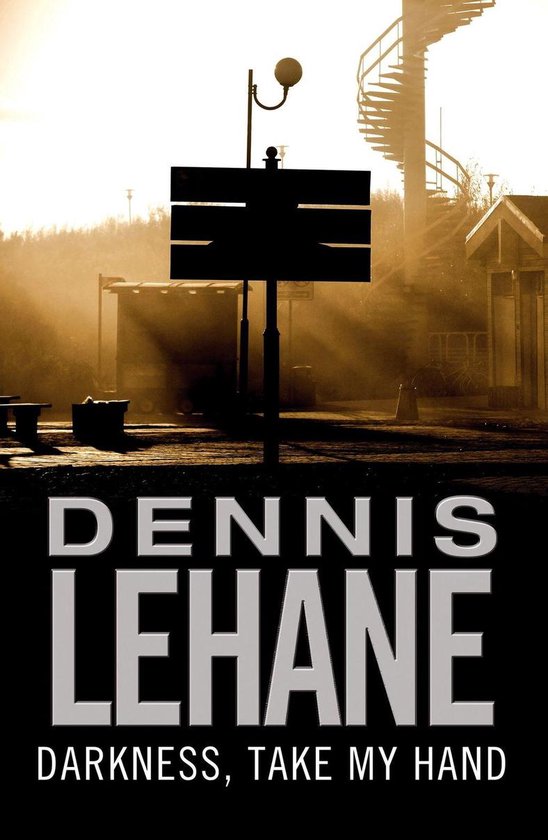 Boekomslag 'Dennis Lehane: Darkness, Take My Hand' met zonnestralen en een spiraaltrap.