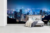 Papier peint photo vinyle - Une vue aérienne de Hong Kong la nuit largeur 535 cm x hauteur 300 cm - Tirage photo sur papier peint (disponible en 7 tailles)