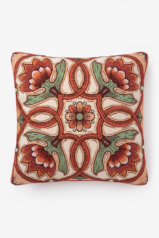 Sierkussen met een symmetrisch bloemendessin in oranje, groen en crème, met een rode bies.