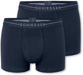 Twee donkerblauwe boxer briefs met SCHIESSER logo op de band, close-up.