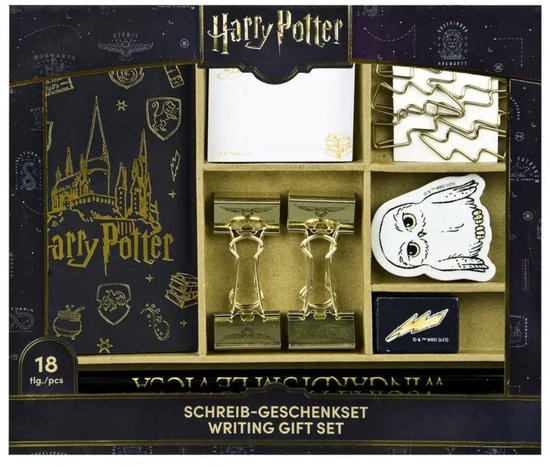 Verpakte Harry Potter schrijfwarenset met map, memo's, paperclips, uilvormige gum en potloden in een gouden en zwarte doos.