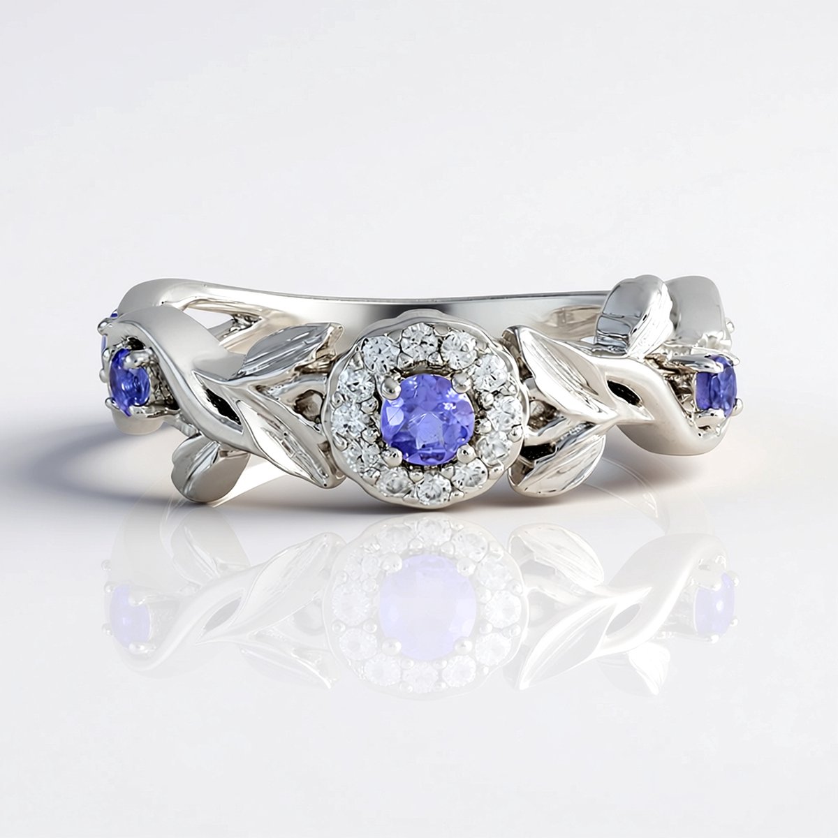 Cavill - Elegante Damesring 925 Sterling Zilver Platina Gecoat - Rondgeslepen Tanzaniet 0,417 ct & Zirkonen 0,129 ct - Bloemenmotief Blauw