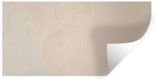 Beige muursticker met cirkelvormige, stralende patronen, met omgeslagen hoek.
